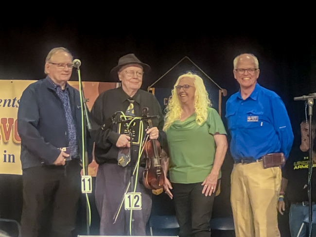 Milton Harkey, Jan Johansson, Vivian Pennington Hopkins, and unidentified at the 2025 Granite Quarry Fiddlers' Convention - photo © Sandy Hatley