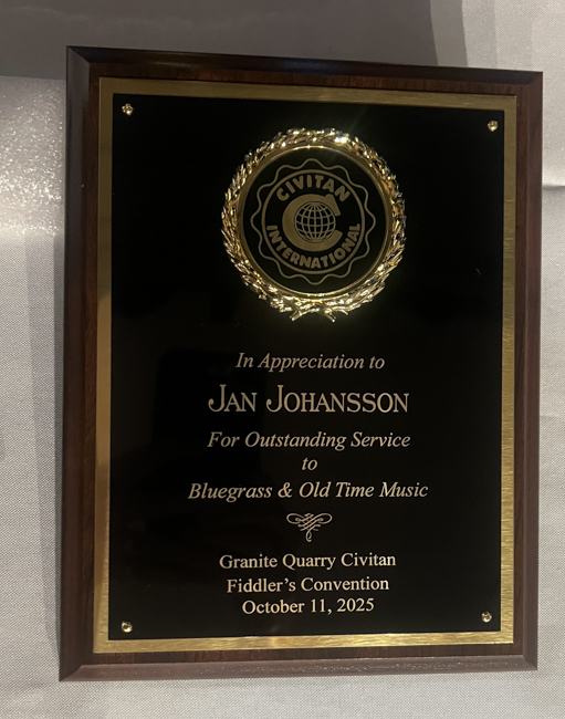 Jan Johansson's award plaque received at the 2025 Granite Quarry Fiddlers' Convention - photo © Sandy Hatley