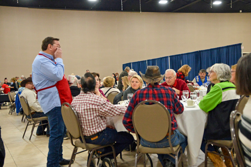 Joe Mullins serving at the Saturday charity brunch at the November 2025 Industrial Strength Bluegrass Festival - photo © Bill Warren