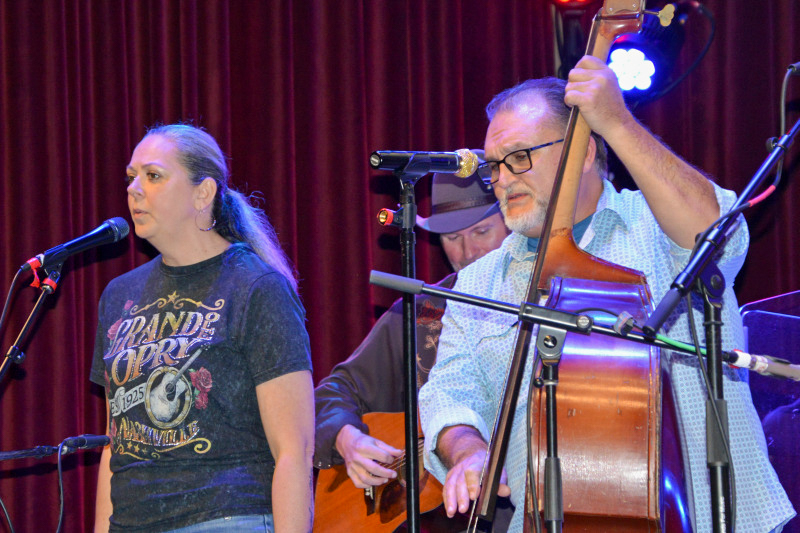 Susan King and Randall Hibbitts with The Smoky Mountain All Stars at the Bluegrass Christmas in the Smokies pre-show party for 2025 - photo © Bill Warren
