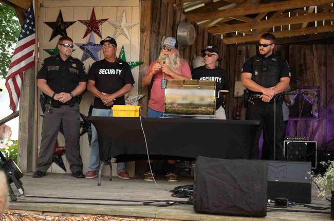 Festival promoter John Bowers leads a giveaway at Pickin' in Parsons 2025 - photo © Jeromie Stephens
