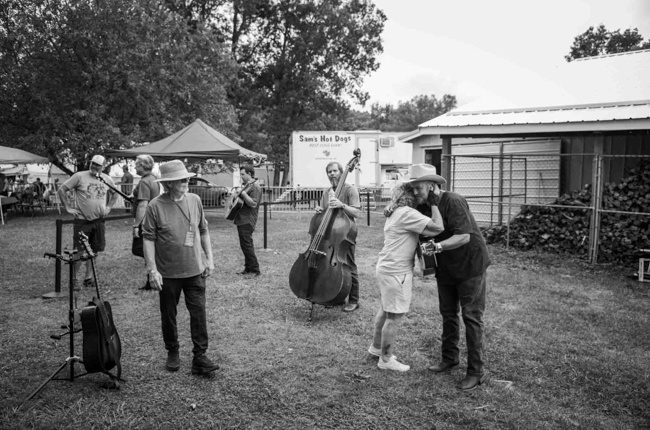 The Gibson Brothers headed to the stage at Pickin' in Parsons 2025 - photo © Jeromie Stephens