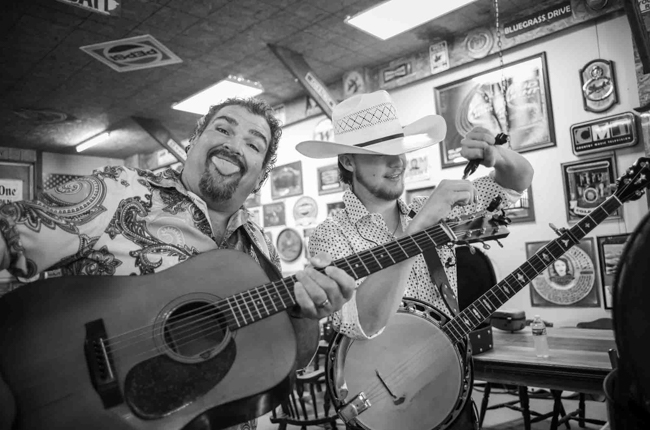 Dave Adkins and Jack Brown clowning backstage at Pickin' in Parsons 2025 - photo © Jeromie Stephens
