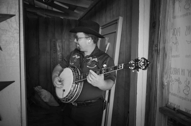 Jereme Brown with The Po' Ramblin' Boys backstage at Pickin' in Parsons 2025 - photo © Jeromie Stephens