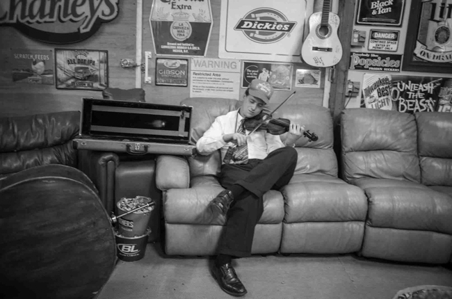 Conner Vlietstra with The Price Sisters backstage at Pickin' in Parsons 2025 - photo © Jeromie Stephens