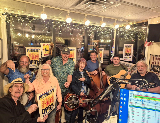 George Hamilton V, Tom Hyatt, Vivian Pennington Hopkins, Big T Lassiter, Pammy Lassiter, Travis Brady, William Britt, and Jean-Luc Leroux at the September 2025 edition of Piedmont Opry Time on WTOB - photo © Sandy Hatley