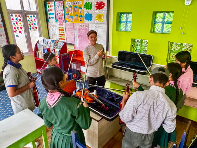 Ben Errington teaching fiddle for the Bluegrass Journeymen Academy at Triyog High School in Kathmandu, Nepal.