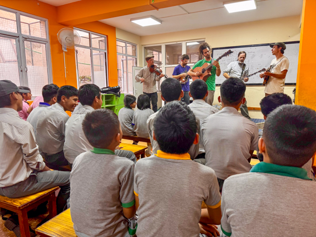 Bluegrass Journeymen Academy faculty concert at Triyog High School in Kathmandu, Nepal. Ben Errington, Patrick Fitzsimons, Chad Harris, Max Winkels, and Brett Kretzer.